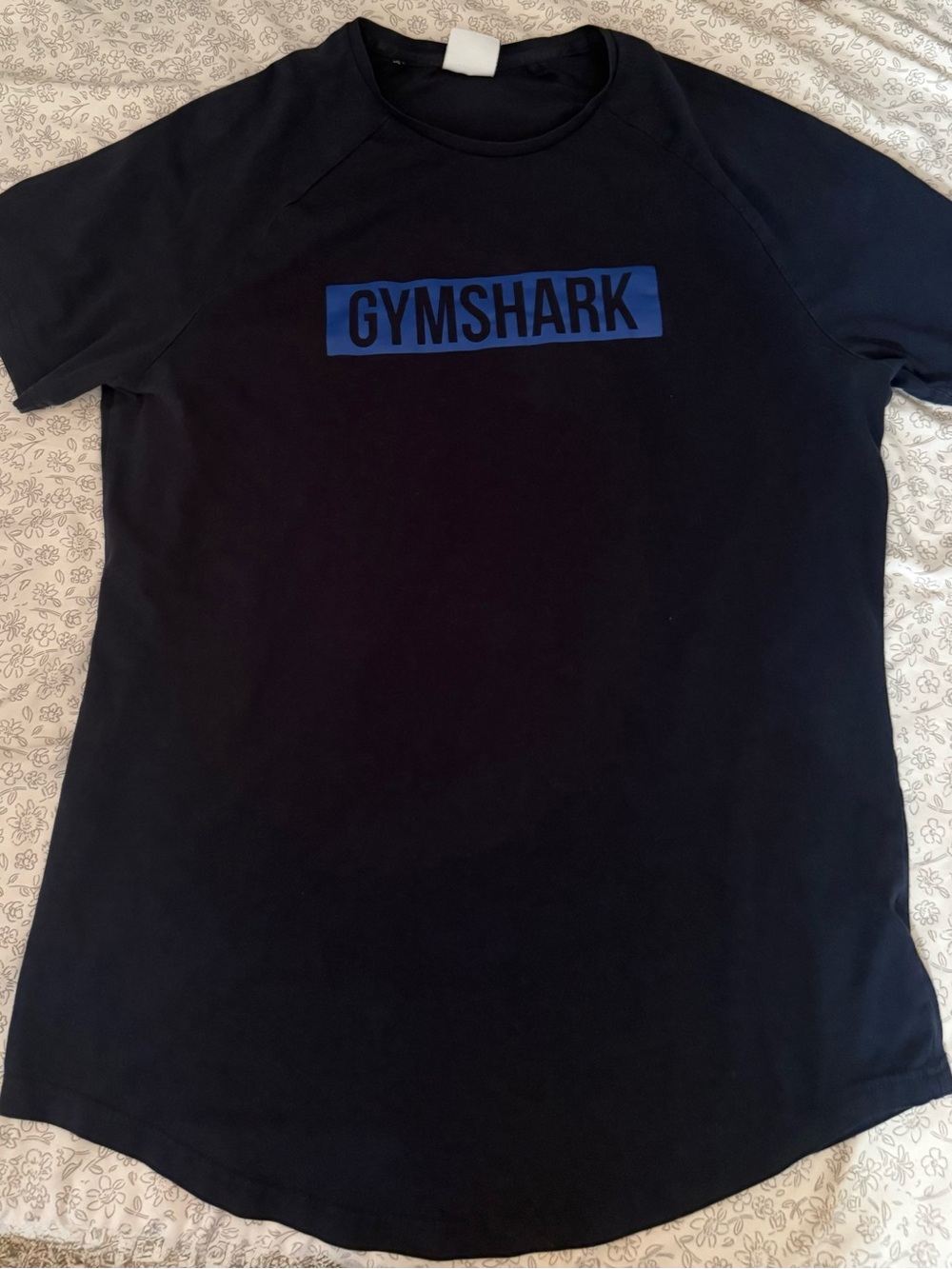 Gymshark navy t shirt with Blue Logo Panel
